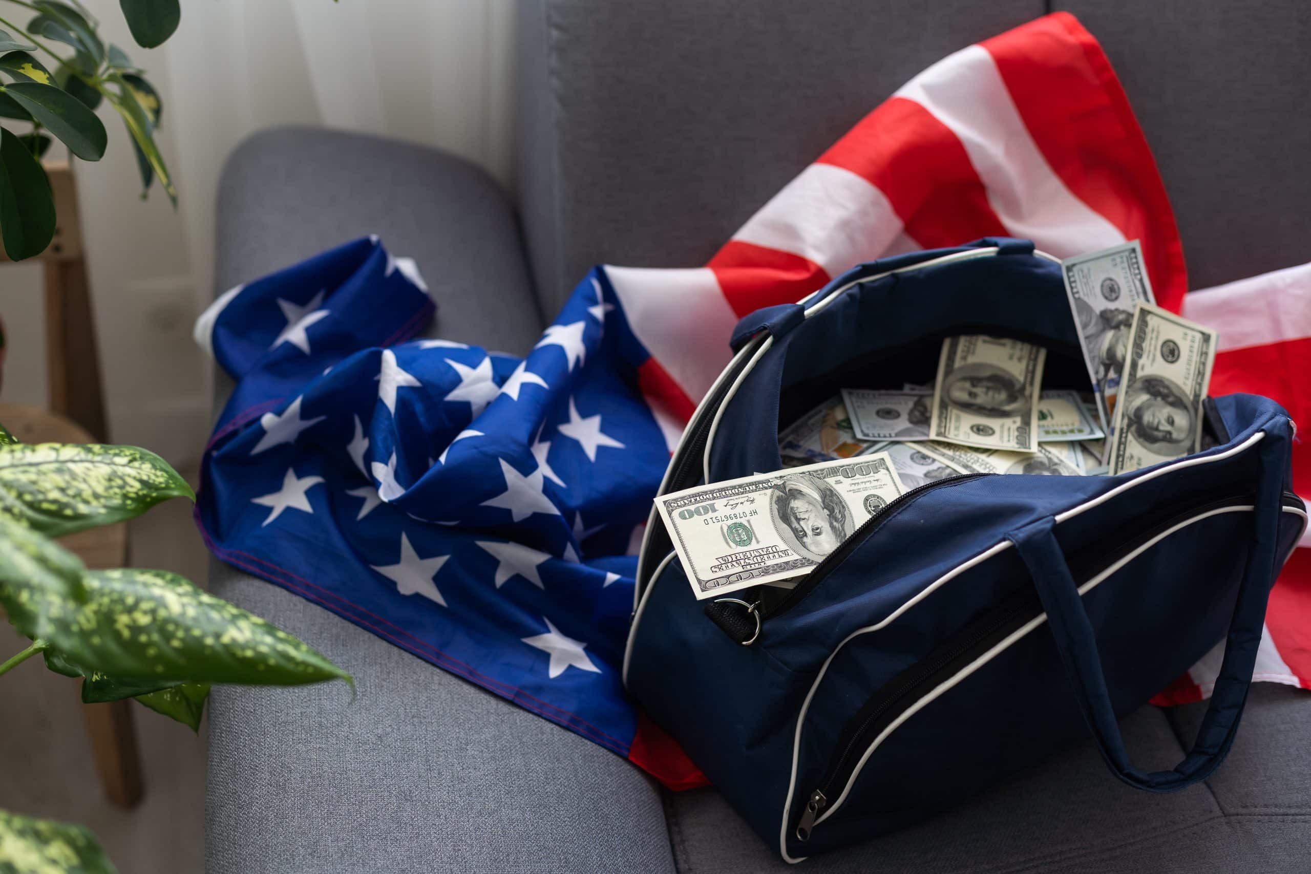 Open suitcase with one million dollars bills stacks