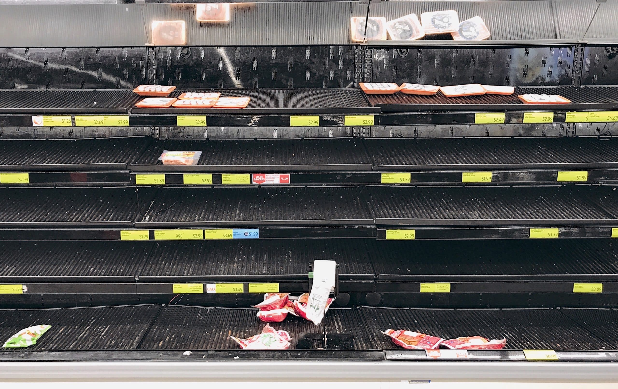 More picked over empty shelves at the grocery store because people are stockpiling supplies